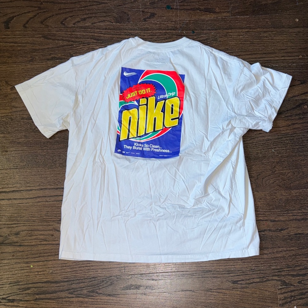 Nike Men’s XL White Short Sleeve Tee with Yellow Logo & Colorful Back Design!